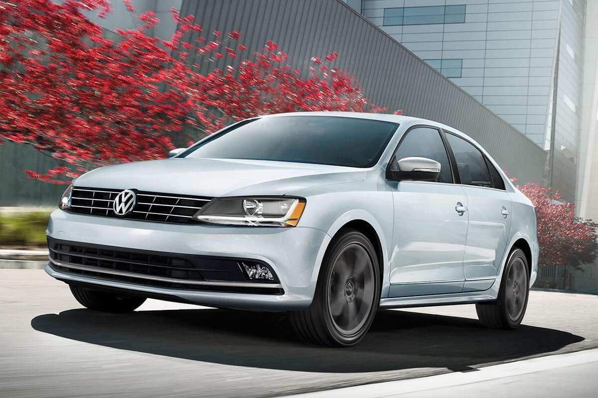 2018 Volkswagen Jetta with red trees